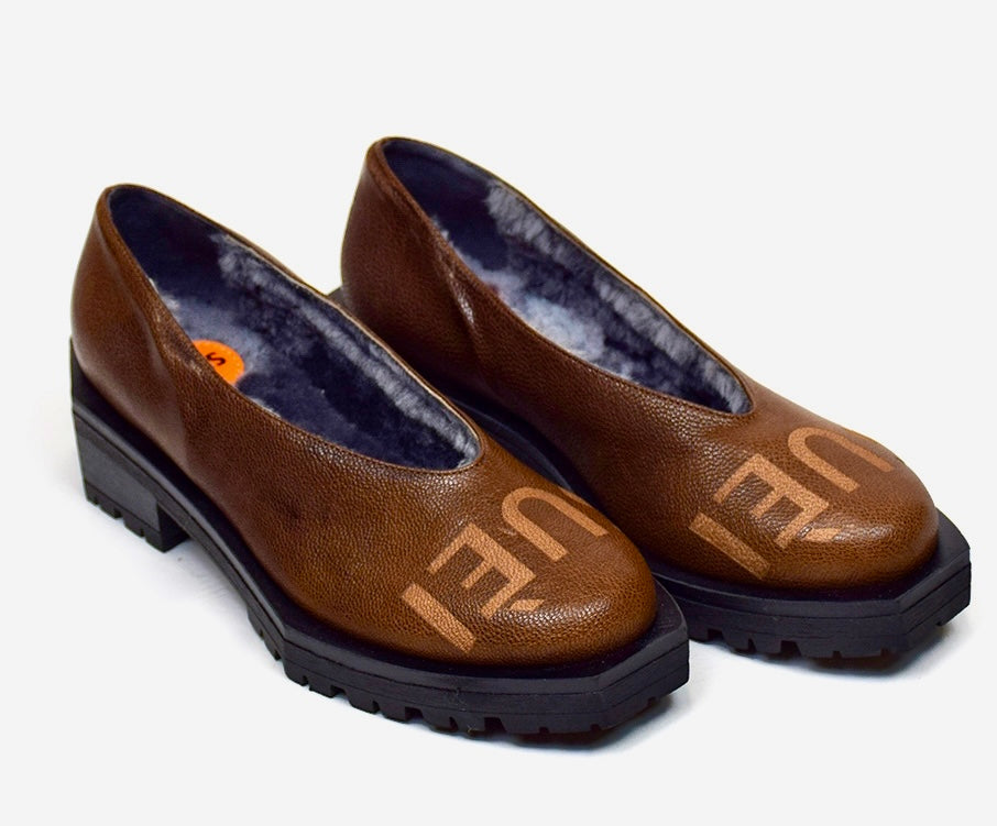 SLIP-ON OF SHE-GOAT LEATHER WITH HEXAGONAL HEELS