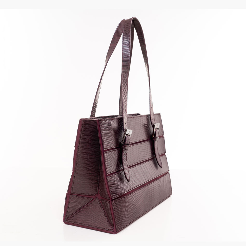 DOTTI Luxury handbags, Flora medium tote bag, made of lizard leather in sophisticated aubergine shade.  The highlighted beauty of precious leather, makes this DOTTI tote a true statement piece.